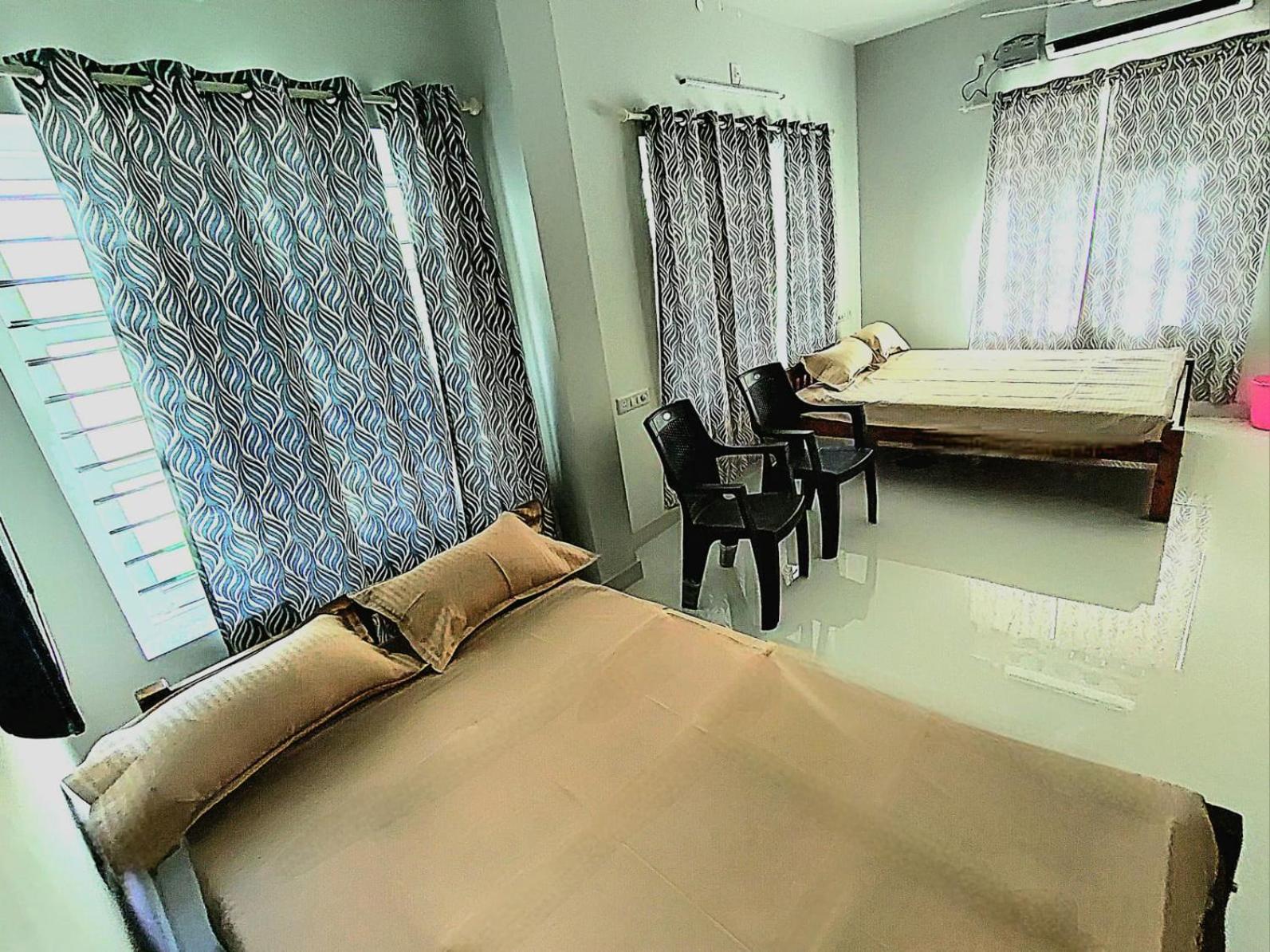 Sivasarass Rooms Thiruvananthapuram Bagian luar foto